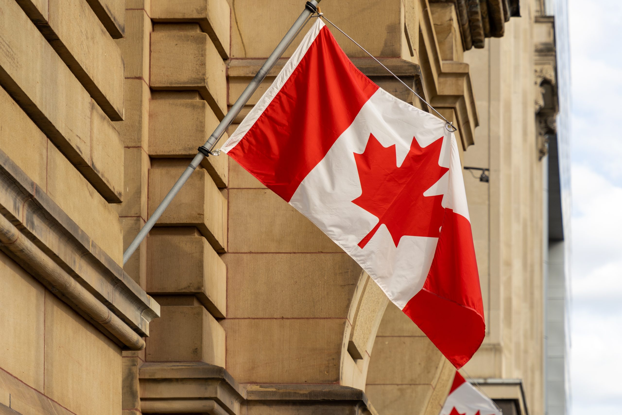 Canadian flag on government building in Ottawa downtown, Ontario in Canada